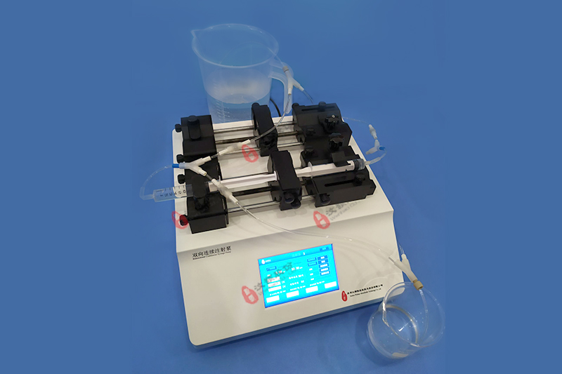 Bidirectional continuous syringe pump